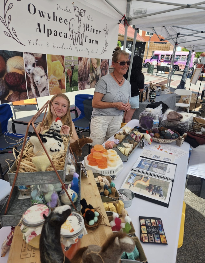 The family at their Owyhee River Alpaca Farm booth at the Treasure Valley farmers market